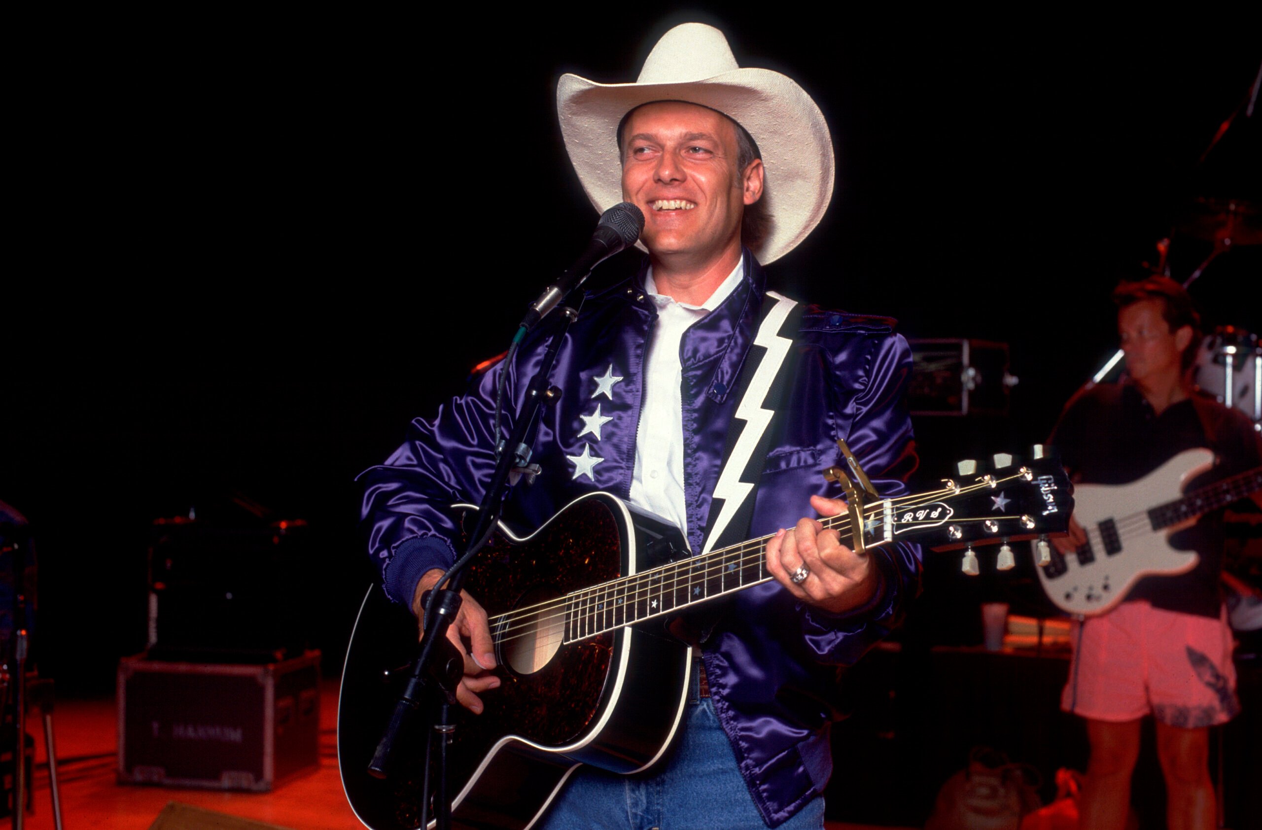 American County musician Ricky Van Shelton plays guitar as he performs onstage at the Holiday Star Theater, Merrillville, Indiana, August 2, 1988. 